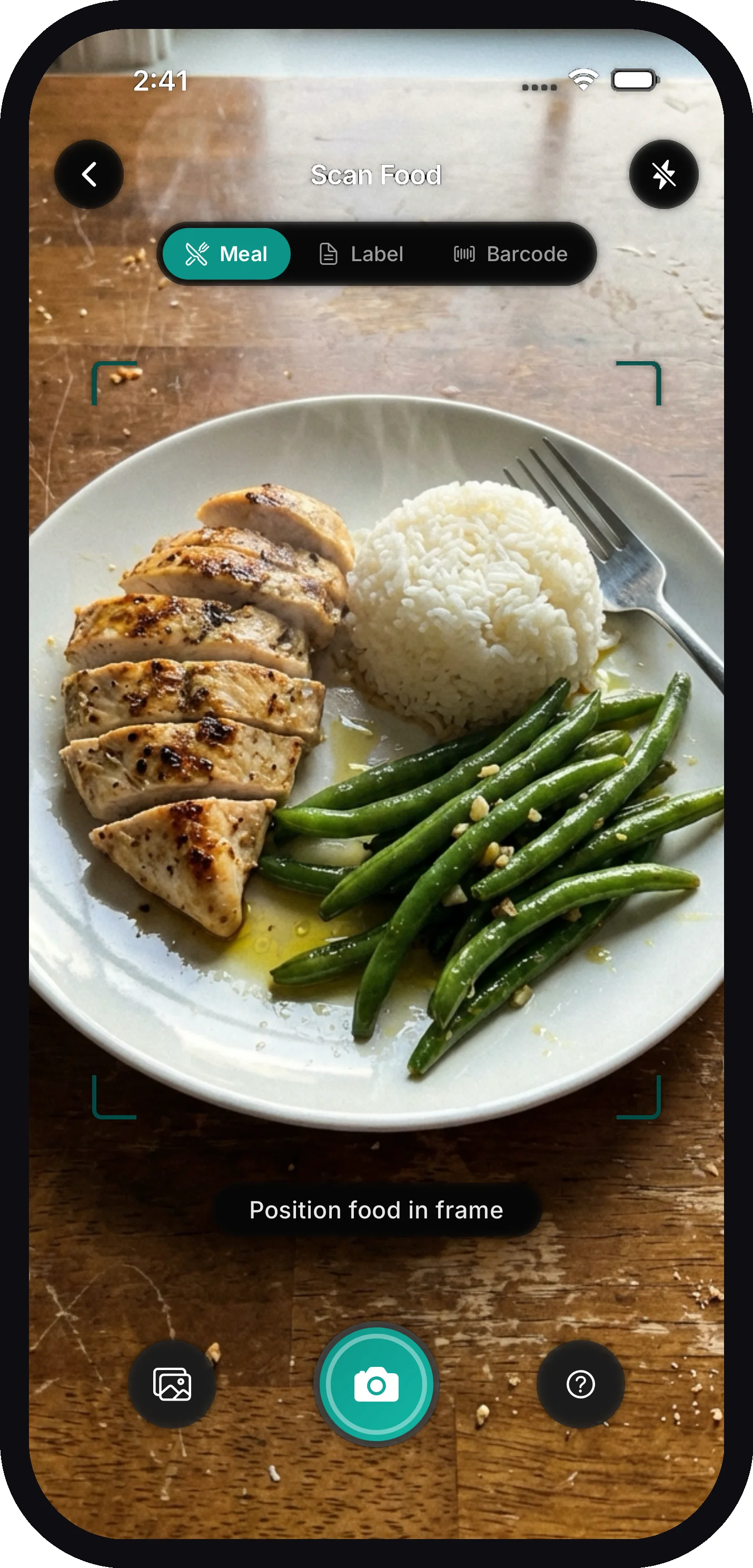 The camera in Meal mode with a plate of chicken, rice, and green beans framed and ready to scan